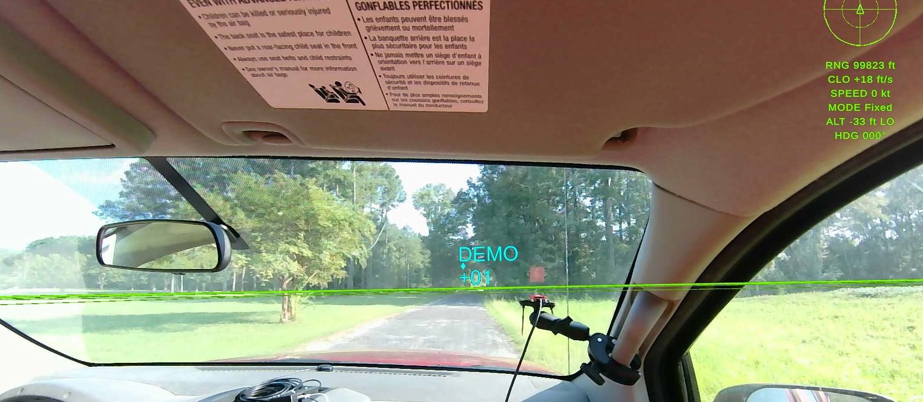 Cyan HMARD DEMO traffic target with a +01 altitude label during a vehicle demonstration